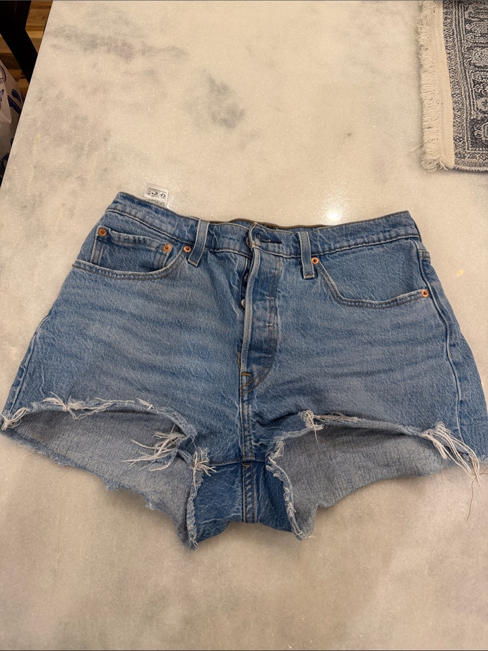 Levi's Mid Blue Distressed High-Rise Jean Shorts